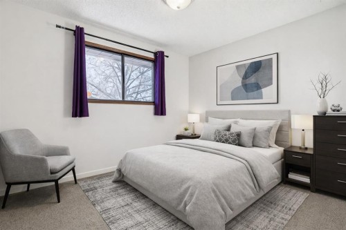 9 Jensen Crescent Ne, Airdrie, AB - Indoor Photo Showing Bedroom