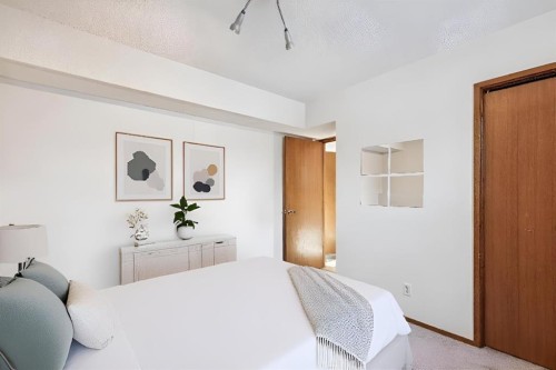 9 Jensen Crescent Ne, Airdrie, AB - Indoor Photo Showing Bedroom