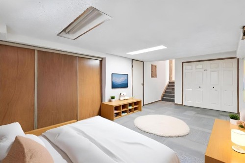 9 Jensen Crescent Ne, Airdrie, AB - Indoor Photo Showing Bedroom