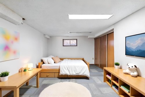 9 Jensen Crescent Ne, Airdrie, AB - Indoor Photo Showing Bedroom