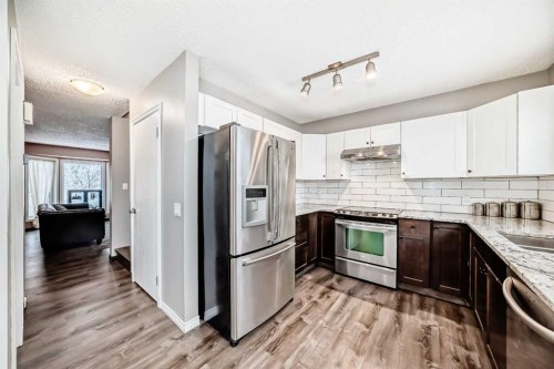 238 Berwick Drive Nw, Calgary, AB - Indoor Photo Showing Kitchen With Upgraded Kitchen
