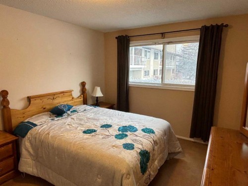 511-200 Brookpark Drive Sw, Calgary, AB - Indoor Photo Showing Bedroom