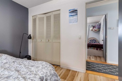744 Hunterston Crescent Nw, Calgary, AB - Indoor Photo Showing Bedroom