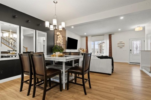 10 Emberside Link, Cochrane, AB - Indoor Photo Showing Dining Room