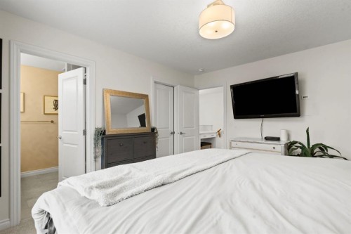 10 Emberside Link, Cochrane, AB - Indoor Photo Showing Bedroom