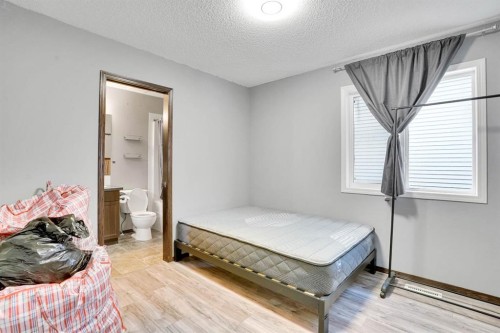 210 Cranberry Place Se, Calgary, AB - Indoor Photo Showing Bedroom