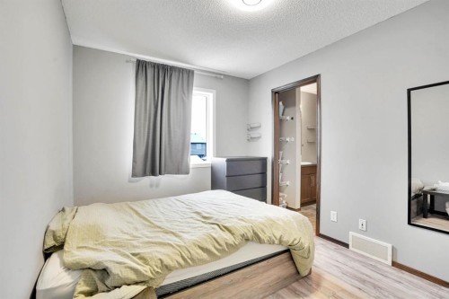 210 Cranberry Place Se, Calgary, AB - Indoor Photo Showing Bedroom
