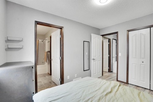 210 Cranberry Place Se, Calgary, AB - Indoor Photo Showing Bedroom