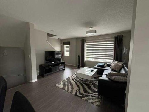 202 Evansridge Park Nw, Calgary, AB - Indoor Photo Showing Living Room