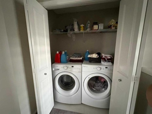202 Evansridge Park Nw, Calgary, AB - Indoor Photo Showing Laundry Room