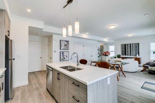 72-2117 81St Street Sw, Calgary, AB - Indoor Photo Showing Kitchen With Double Sink