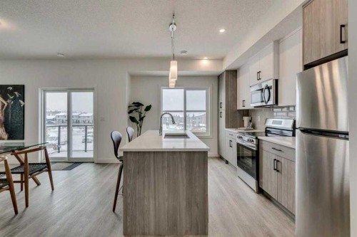72-2117 81St Street Sw, Calgary, AB - Indoor Photo Showing Kitchen With Stainless Steel Kitchen