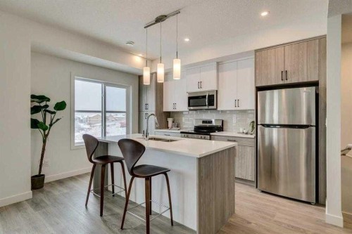 72-2117 81St Street Sw, Calgary, AB - Indoor Photo Showing Kitchen With Stainless Steel Kitchen With Upgraded Kitchen