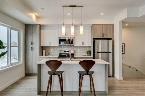 72-2117 81St Street Sw, Calgary, AB - Indoor Photo Showing Kitchen With Stainless Steel Kitchen