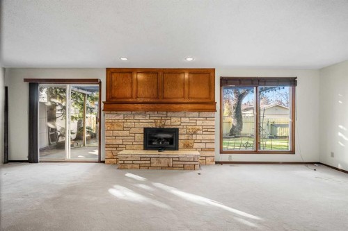 720 Parkvalley Road Se, Calgary, AB - Indoor With Fireplace