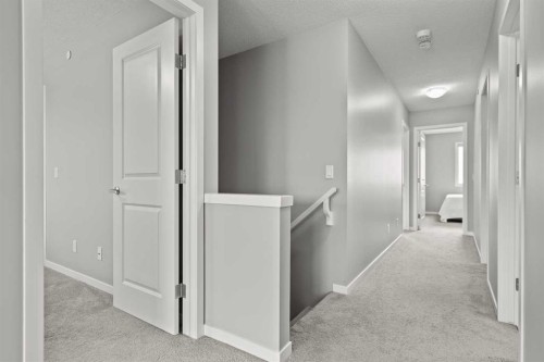 66 Howse Common Ne, Calgary, AB - Indoor Photo Showing Other Room