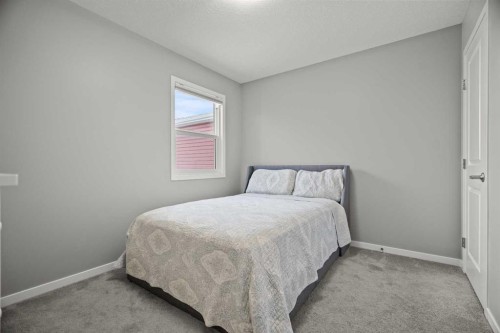 66 Howse Common Ne, Calgary, AB - Indoor Photo Showing Bedroom