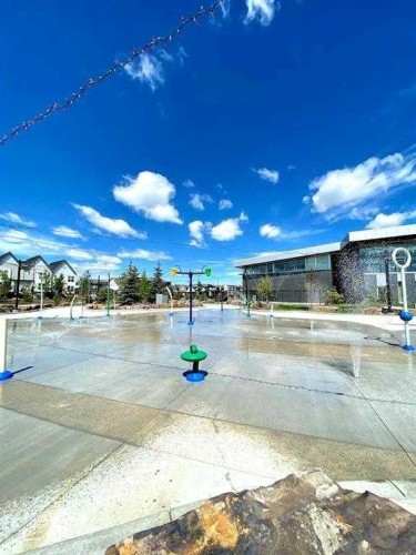 66 Howse Common Ne, Calgary, AB - Outdoor With Body Of Water With View