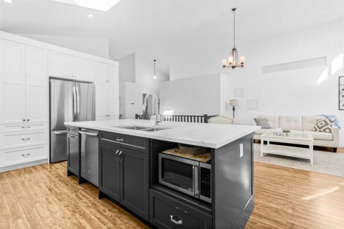 811 Boulder Creek Drive Se, Langdon, AB - Indoor Photo Showing Kitchen With Stainless Steel Kitchen With Double Sink With Upgraded Kitchen