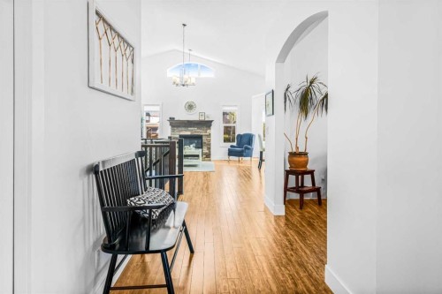 811 Boulder Creek Drive Se, Langdon, AB - Indoor Photo Showing Other Room With Fireplace