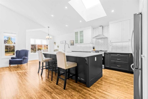 811 Boulder Creek Drive Se, Langdon, AB - Indoor Photo Showing Kitchen With Upgraded Kitchen