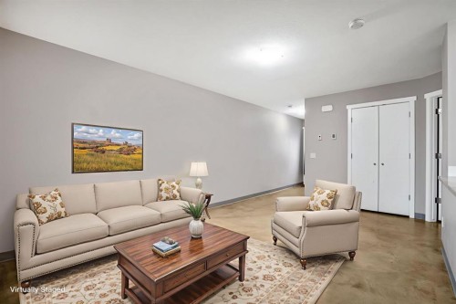 D-204 6 Avenue, Strathmore, AB - Indoor Photo Showing Living Room