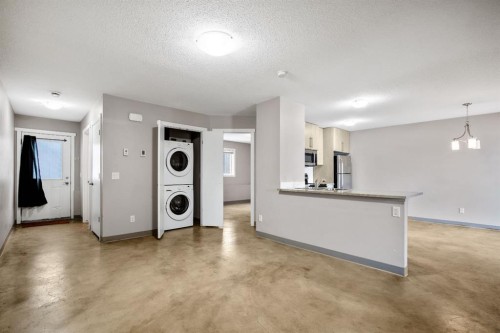 D-204 6 Avenue, Strathmore, AB - Indoor Photo Showing Laundry Room