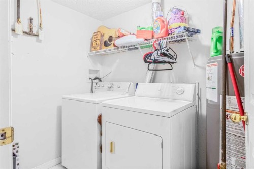 102-139 26 Avenue Nw, Calgary, AB - Indoor Photo Showing Laundry Room
