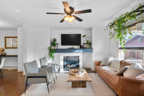 263 Evanston Way Nw, Calgary, AB - Indoor Photo Showing Living Room With Fireplace