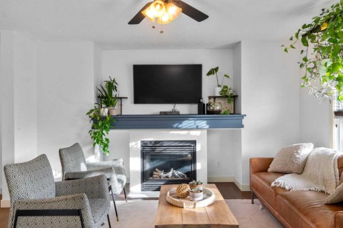 263 Evanston Way Nw, Calgary, AB - Indoor Photo Showing Living Room With Fireplace