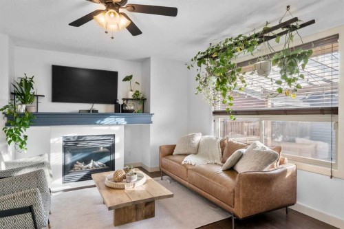 263 Evanston Way Nw, Calgary, AB - Indoor Photo Showing Living Room With Fireplace