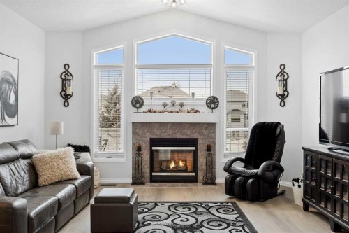 127 Invermere Close, Chestermere, AB - Indoor Photo Showing Living Room With Fireplace