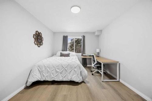 127 Invermere Close, Chestermere, AB - Indoor Photo Showing Bedroom