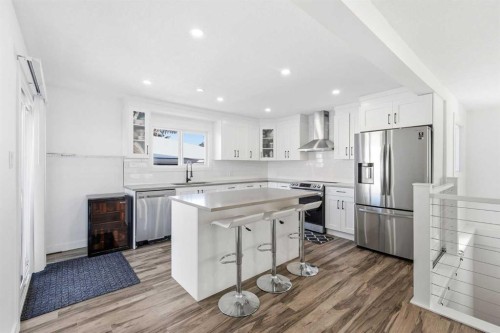 69 Harrow Crescent Sw, Calgary, AB - Indoor Photo Showing Kitchen With Stainless Steel Kitchen With Upgraded Kitchen