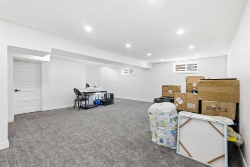 69 Harrow Crescent Sw, Calgary, AB - Indoor Photo Showing Basement