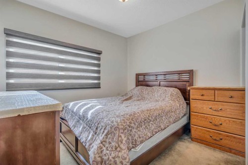713 44 Street Se, Calgary, AB - Indoor Photo Showing Bedroom