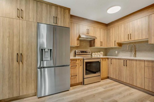 713 44 Street Se, Calgary, AB - Indoor Photo Showing Kitchen With Stainless Steel Kitchen