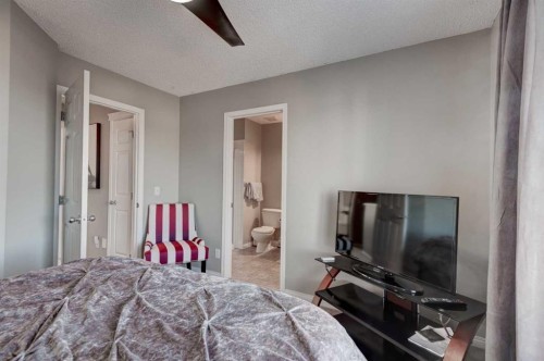 219 Copperfield Lane Se, Calgary, AB - Indoor Photo Showing Bedroom
