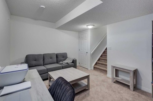 219 Copperfield Lane Se, Calgary, AB - Indoor Photo Showing Other Room