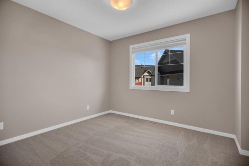 136 New Brighton Point Se, Calgary, AB - Indoor Photo Showing Other Room