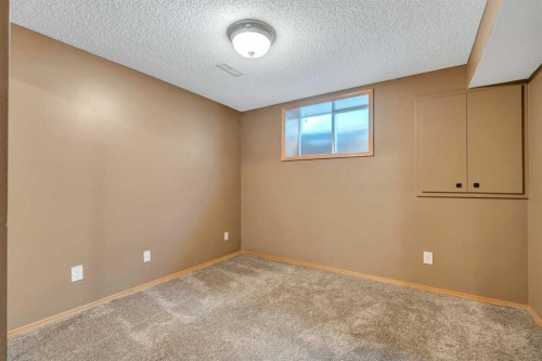 60 Citadel Peak Mews Nw, Calgary, AB - Indoor Photo Showing Other Room