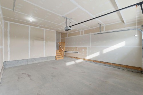 240 Nolanhurst Crescent Nw, Calgary, AB - Indoor Photo Showing Garage