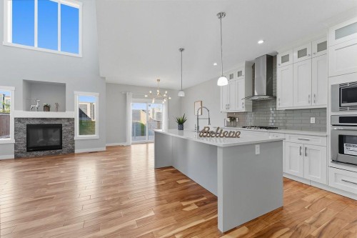 240 Nolanhurst Crescent Nw, Calgary, AB - Indoor Photo Showing Kitchen With Fireplace With Upgraded Kitchen