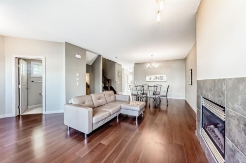 12 Cougar Ridge Landing Sw, Calgary, AB - Indoor Photo Showing Living Room