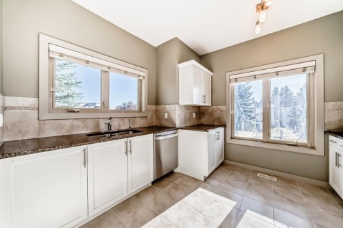 12 Cougar Ridge Landing Sw, Calgary, AB - Indoor Photo Showing Kitchen