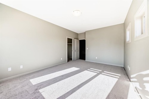 12 Cougar Ridge Landing Sw, Calgary, AB - Indoor Photo Showing Other Room