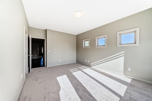 12 Cougar Ridge Landing Sw, Calgary, AB - Indoor Photo Showing Other Room