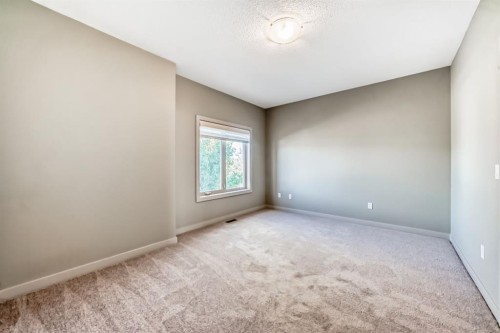 12 Cougar Ridge Landing Sw, Calgary, AB - Indoor Photo Showing Other Room