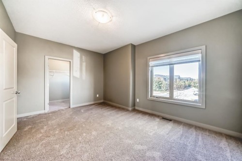 12 Cougar Ridge Landing Sw, Calgary, AB - Indoor Photo Showing Other Room
