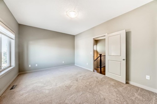 12 Cougar Ridge Landing Sw, Calgary, AB - Indoor Photo Showing Other Room